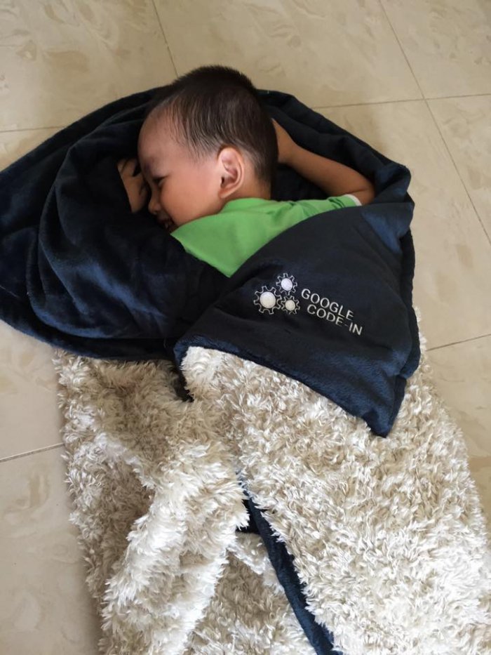 Sleeping peacefully - Nephew of Michael Cheng: Mentor's Family Enjoying "Open Source" Thank you package 